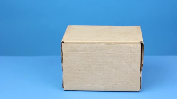 Courier Hands Surgery Gloves Picks Cardboard Box Blue Table Safety Stock Video C Worklater 357324730