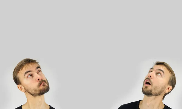 Два Человека Головы Различными Эмоциями Лица Гримаса Глядя Вверх Несколько — стоковое фото