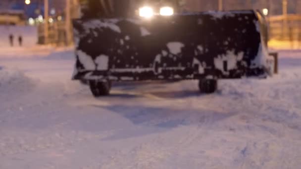 Tractor Grader Working Snow Covered Park Snow Shines Beautifully Lights — Stock Video