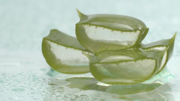 Close Sliced Aloe Vera Leaves Droplets Juice White Background Slow — Stock Video