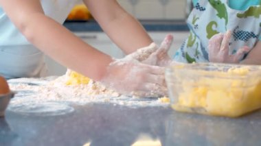 Two children cooking together