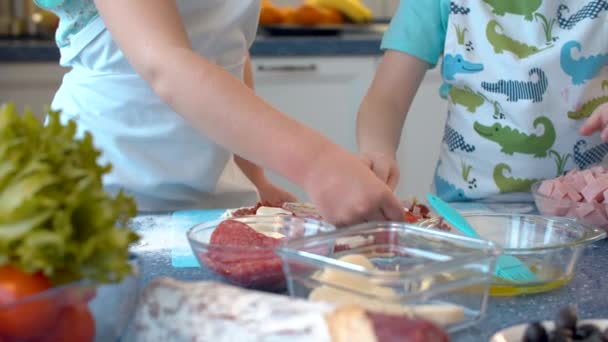 Close Hands Two Children Making Pizza Sister Brother Putting Sliced — Stock Video