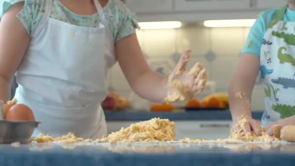 Childrens hands in the dough — Stock video