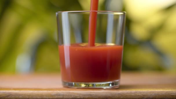 Fresh Tomato Juice Pouring Transparent Glass Close Nutritious Red Beverage — Stock Video