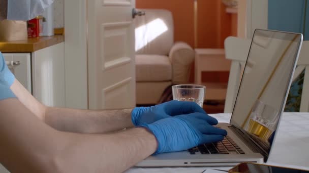 Hands in gloves on a keyboard — Stock Video