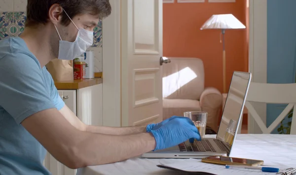 Young Man Working Remotely Typing Computer Kitchen Remote Work Quarantine — Stock Photo, Image