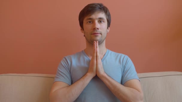 Portrait of young meditating man — Stock Video