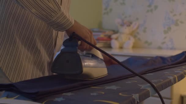 Male hand ironing trousers — Stock Footage Male hand ironing trousers Royalty Free Stock Video