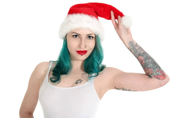 Красива молода жінка в червоному різдвяному капелюсі — стокове фото
