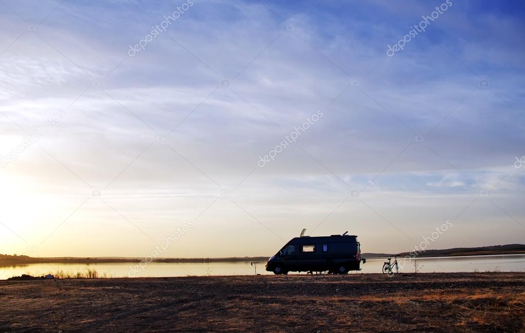 caravan silhouette in alqueva lake, Portugal