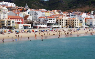 view of Sesimbra beach in Natural Park of Arrabida, Portugal clipart