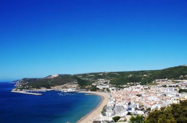 view of Sesimbra beach in Portugal clipart
