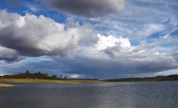Cloudy sky and alqueva lake near Amieira village, Portugal — Stock Photo, Image