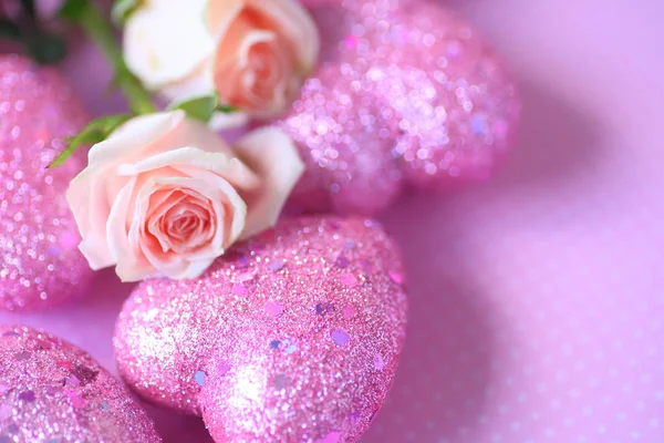 Glitter hearts with pink roses — Stock Photo, Image