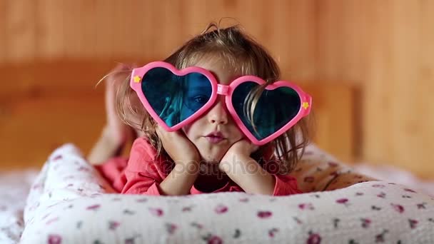Little girl in big glasses — Stock Video