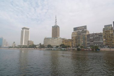 EGYPT, CAIRO, DECEMBER 11, 2019: Buildings on the bank of Nile River in Cairo city, Egypt