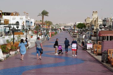 EGYPT, SHARM EL SHEIKH, SINAI, RED SEA, DECEMBER 7, 2019: People in Naama bay in Sharm El Sheikh, Egypt