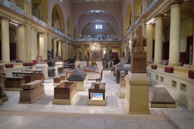 CAIRO, EGYPT, DECEMBER 11, 2019: People in central hall in museum of Egyptian antiquities in Cairo, known commonly as the Egyptian museum or museum of Cairo
