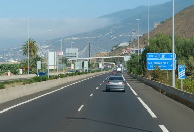 TENERIFE ISLAND, CANARY ISLANDS, SPAIN, SEPTEMBER 27, 2019: Road traffic on the roads of Tenerife island, Spain