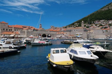 CROATIA, DUBROVNIK, JUNE 28, 2019: Boats in harbour in old town of Dubrovnik, Croatia