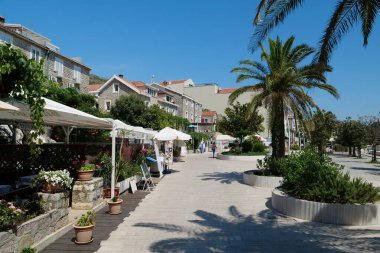 MONTENEGRO, PETROVAC, JULY 1, 2019: People on the embankment in Petrovac city, Montenegro, Adriatic Sea
