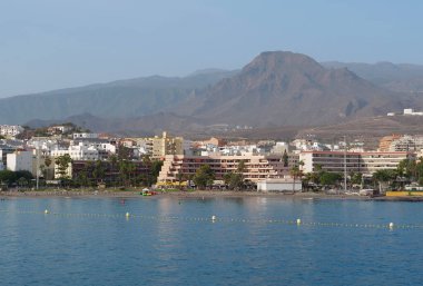 LOS CRISTIANOS, TENERIFE ISLAND, CANARY ISLANDS, SPAIN, OCTOBER 3, 2019: View on Los Cristianos city on Tenerife island, Canary islands. View from Volcan de Taburiente ferry