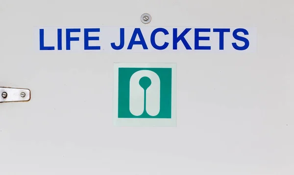 Life Jackets Sign on Door — Stock Photo, Image
