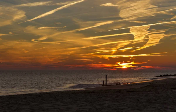 Pôr do sol em Cape May Point New Jersey Shore Fotos De Bancos De Imagens