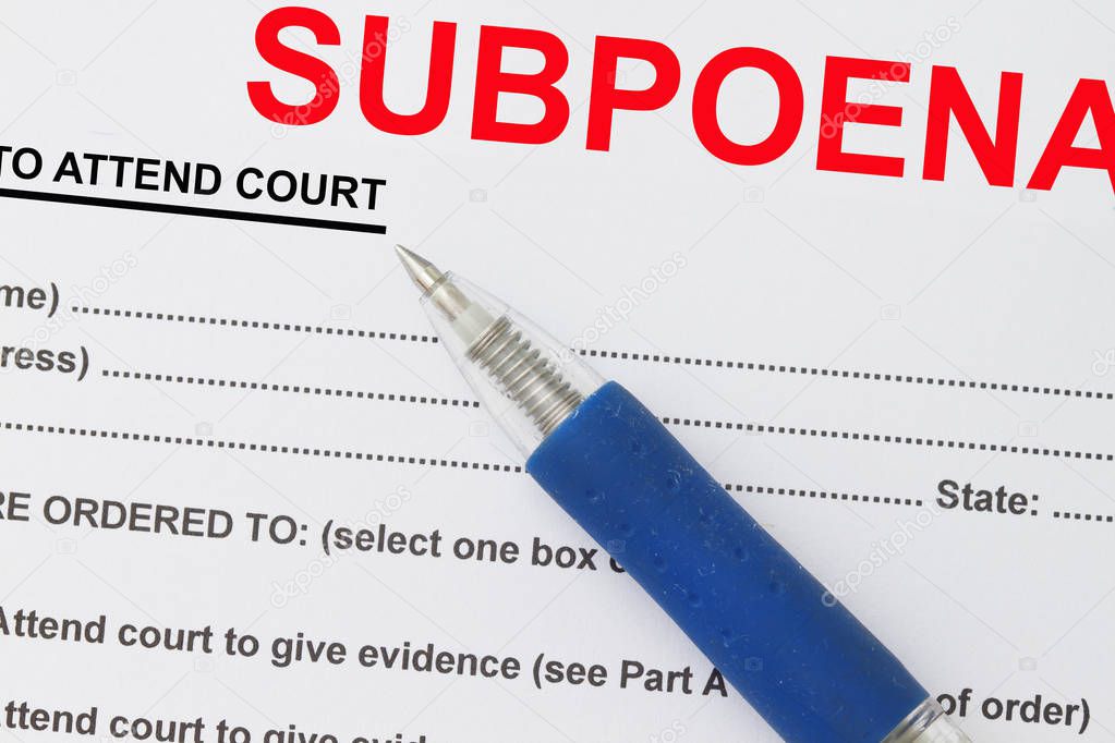 subpoena with pen