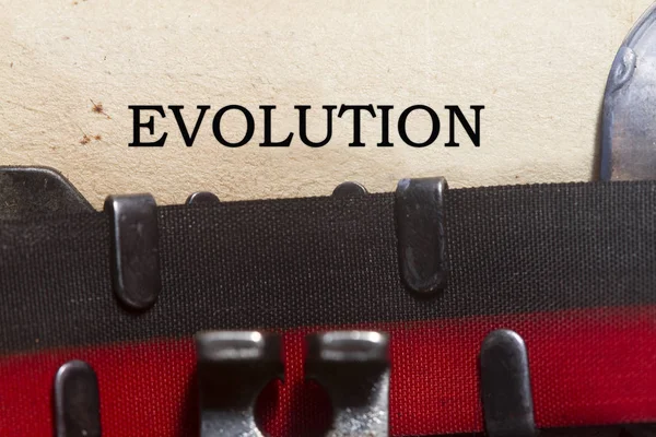 Evolutie getypt op een oude vintage papier — Stockfoto