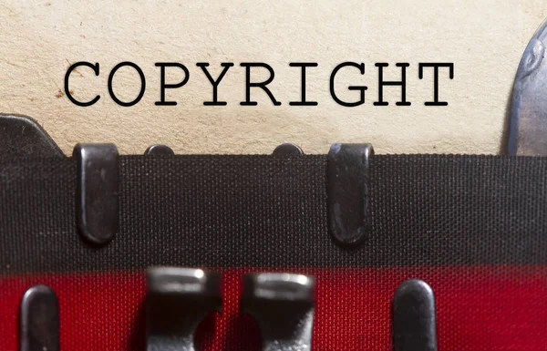 Copyright getypt op een oude vintage papier — Stockfoto