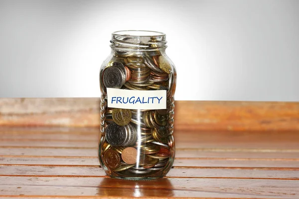 Glass Jar Full Coins Represents Frugality Concept Masking Tape Frugality — Stock Photo, Image