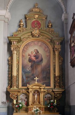 Saint Joseph holding çocuk İsa