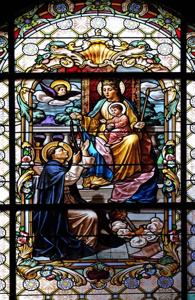 Virgin Mary with baby Jesus and Saint Dominic — Stock Photo, Image