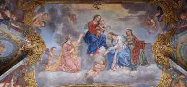 Bebek İsa Azizler ve melekler çevrili ile Meryem Ana