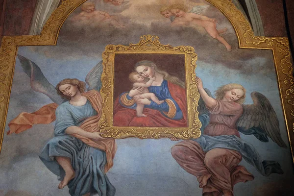 Bebek İsa Azizler ve melekler çevrili ile Meryem Ana