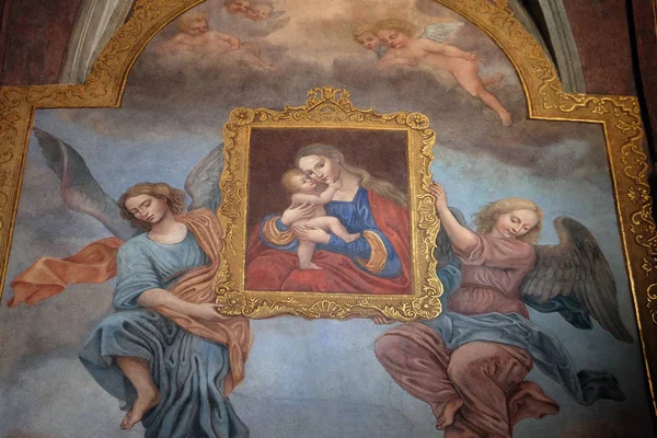 Bebek İsa Azizler ve melekler çevrili ile Meryem Ana