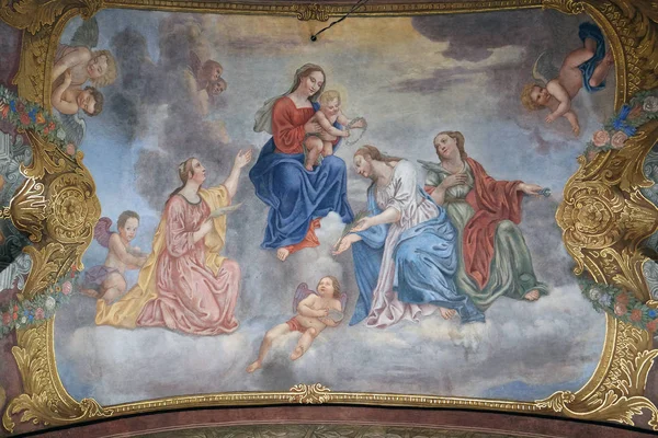 Bebek İsa Azizler ve melekler çevrili ile Meryem Ana