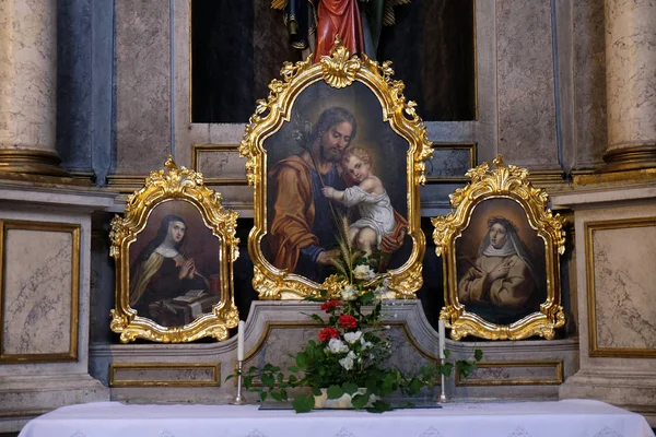 Saint Joseph holding child Jesus — Stock Photo, Image