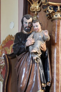 Saint joseph holding bebek İsa 