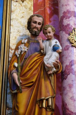 Saint joseph holding bebek İsa 