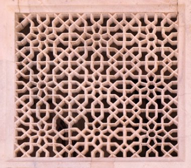 Güzel taş oymalar duvardaki Fatehpur Sikri karmaşık, Uttar Pradesh, Hindistan.