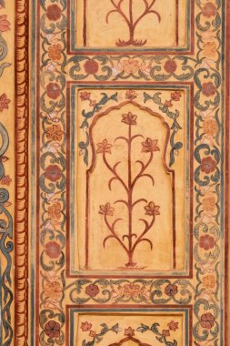 Jaipur, Rajasthan, Hindistan Amber Fort sarayda duvara güzel süsleme.