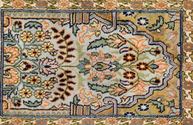 Handmade woven rug, oriental craft in Jaipur, Rajasthan, India. clipart