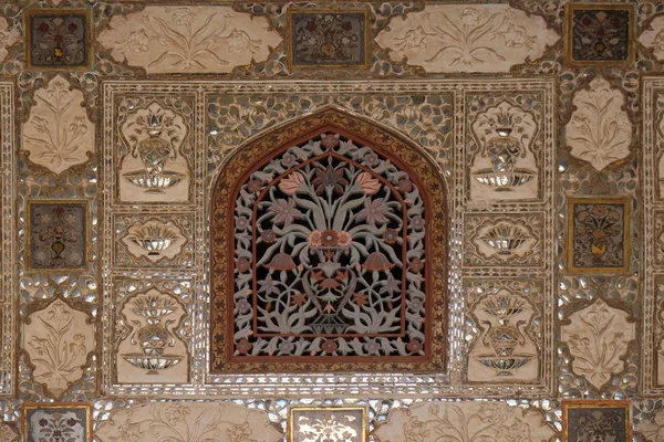 Detail of the mirrored ceiling in the Mirror Palace at Amber Fort in Jaipur, Rajasthan, India.