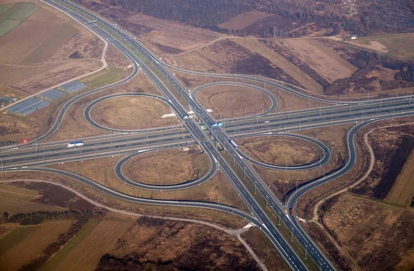 Aerial highway junction. Highway shape like number 8 and infinity sign.