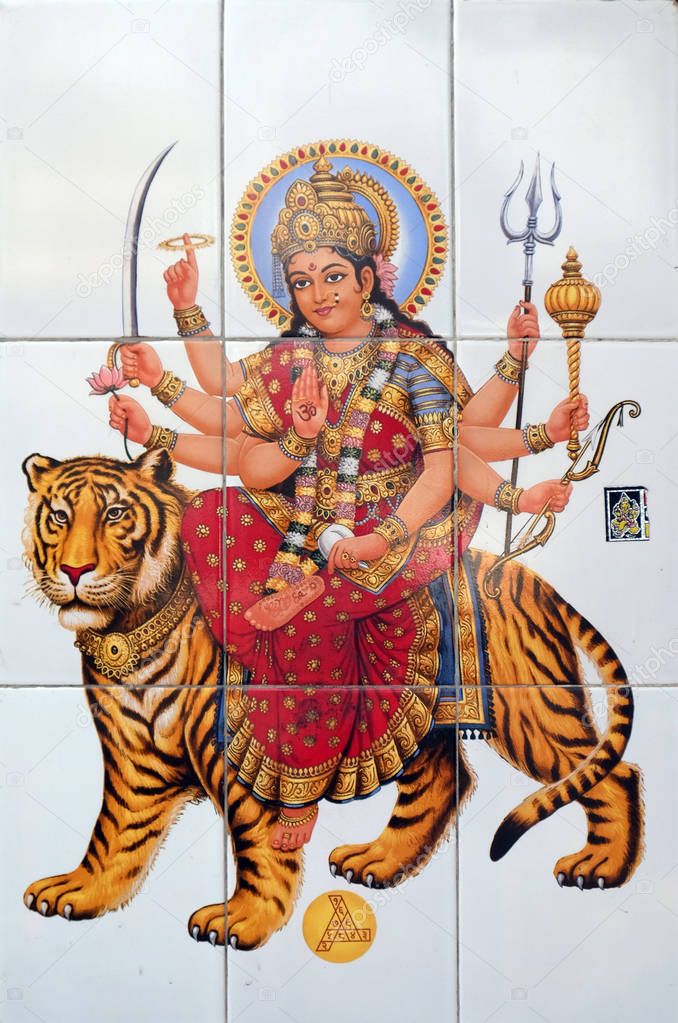 Colorful illustration of Hindu goddess Durga on the wall in Kolkata, India.