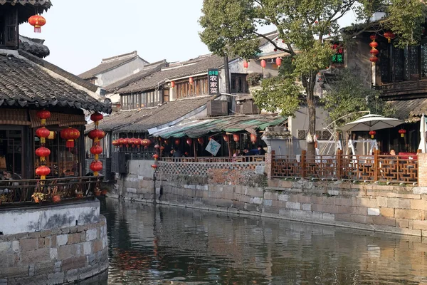 Chinese architecture and buildings lining the water canals to Xitang town in Zhejiang Province, China.