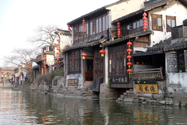 The Chinese architecture and buildings lining the water canals to Xitang town in Zhejiang Province, China.