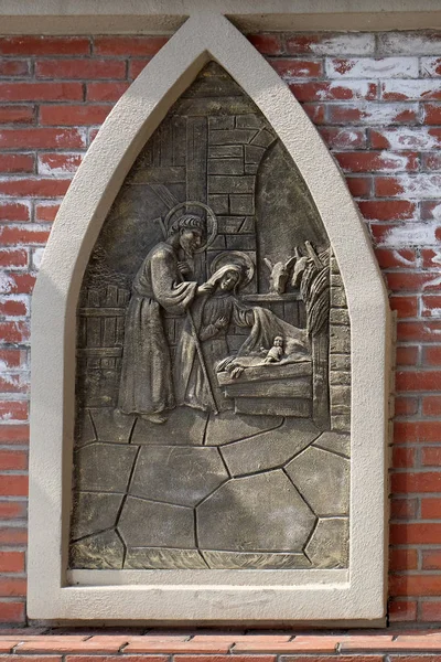 The birth of Jesus, the outer wall of the cathedral of St. Ignatius in Shanghai, China.